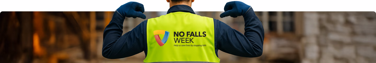 safegate employee point at back of his hi visibility vest, showing logo for No Falls Week